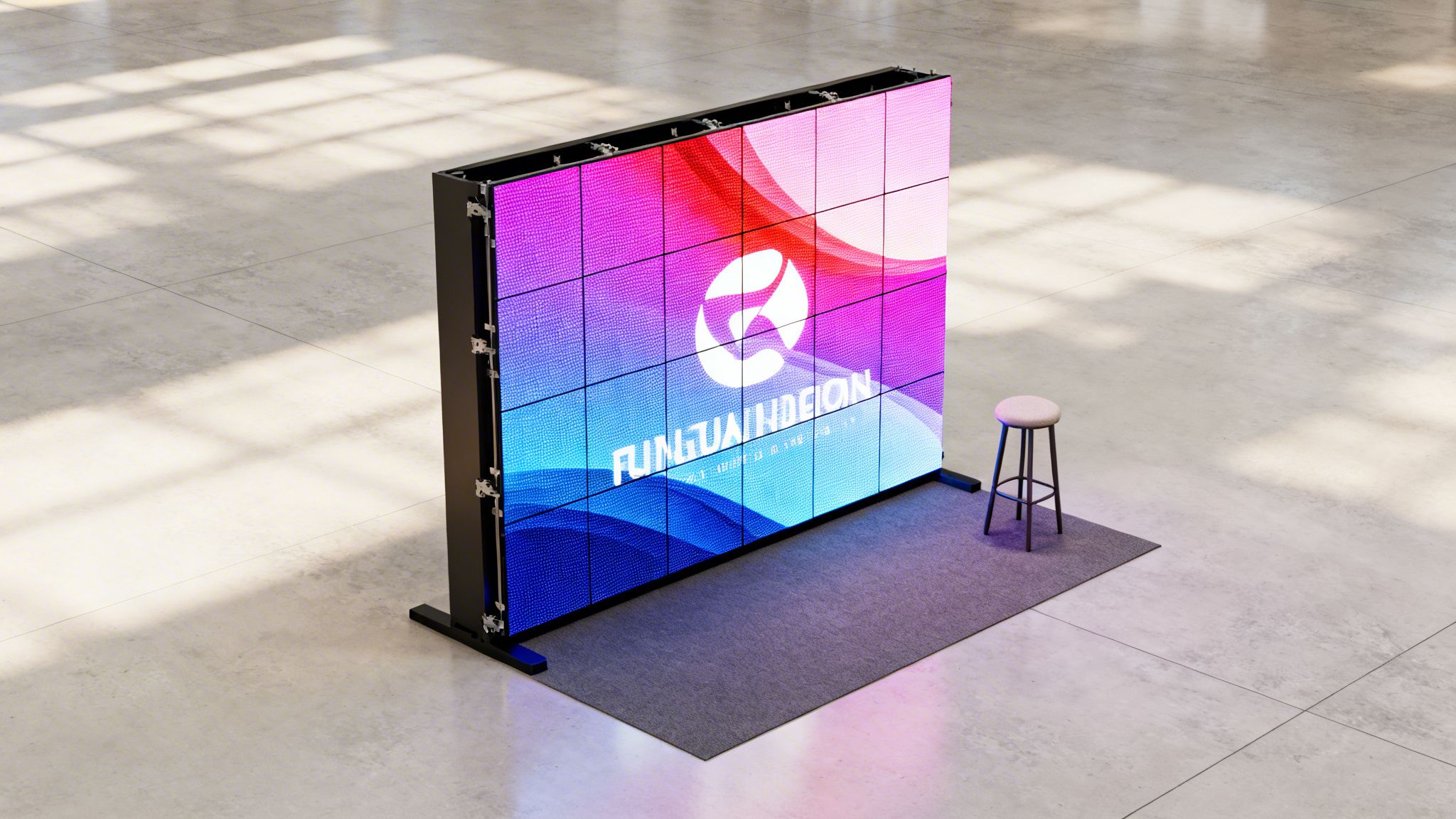 A large, vibrant LED video wall displaying 'FUNFUJI DESIGN' with a white stool on a gray mat.
